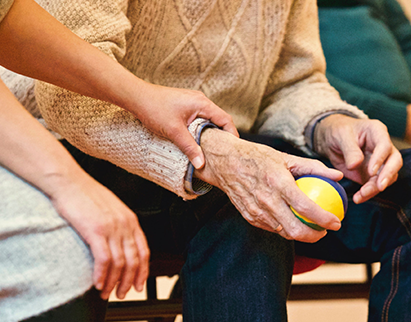 elderly person holding a stress ball with Medicare Supplement Plans in Tampa, Brandon, Sarasota, St. Petersburg, Cape Coral, Port Charlotte