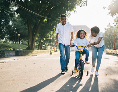 Open Enrollment in Lakeland, FL Family Walking/Riding Bike 