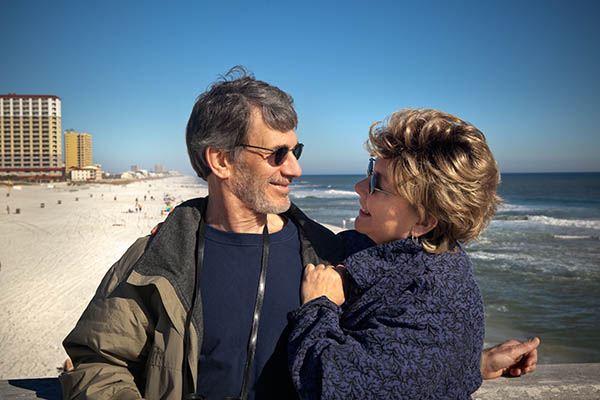 Couple at the Beach enjoying their Open Enrollment in Tampa, FL