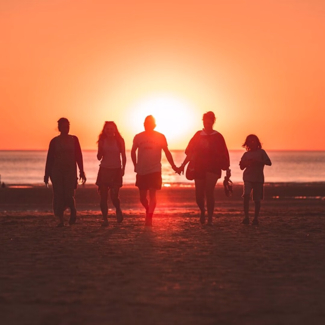 Family silhouette at sunset with under 65 health insurance in Lakeland