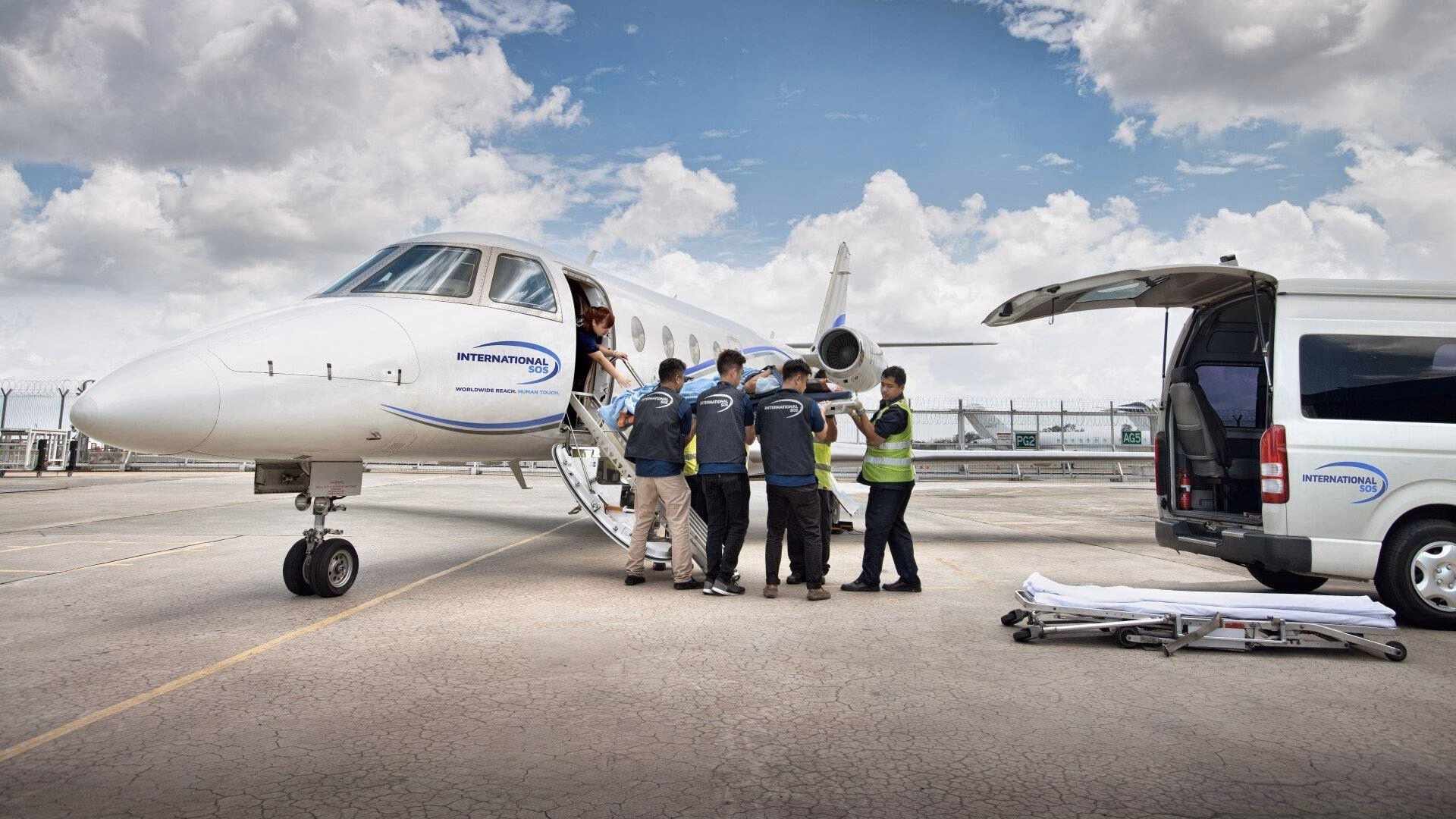 Medical evacuation jet on the tarmac, covered by travel health insurance from Fort Myers